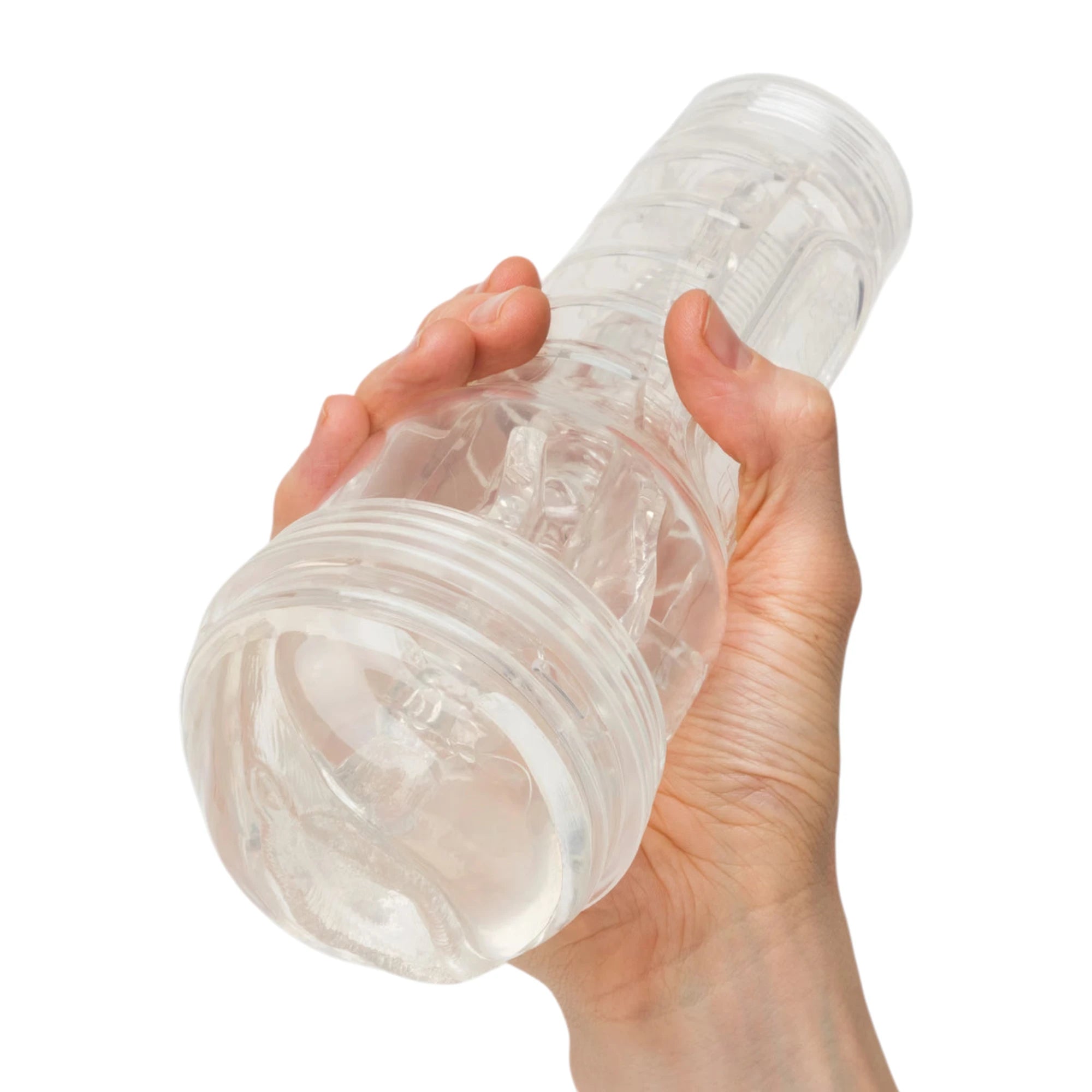 Fleshlight Ice Lady Crystal male masturbator held in hand displaying transparent TPE material, ribbed casing, detailed interior texture pattern, and compact size against white background