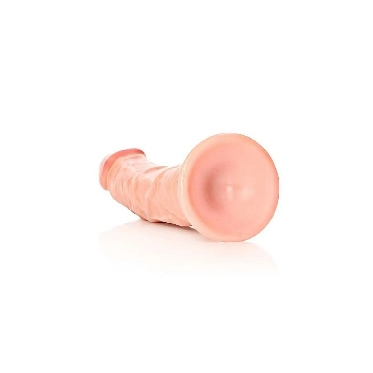 Real Rock curved realistic dildo with suction cup 10 inch lying on its side showing the suction cup base against white background