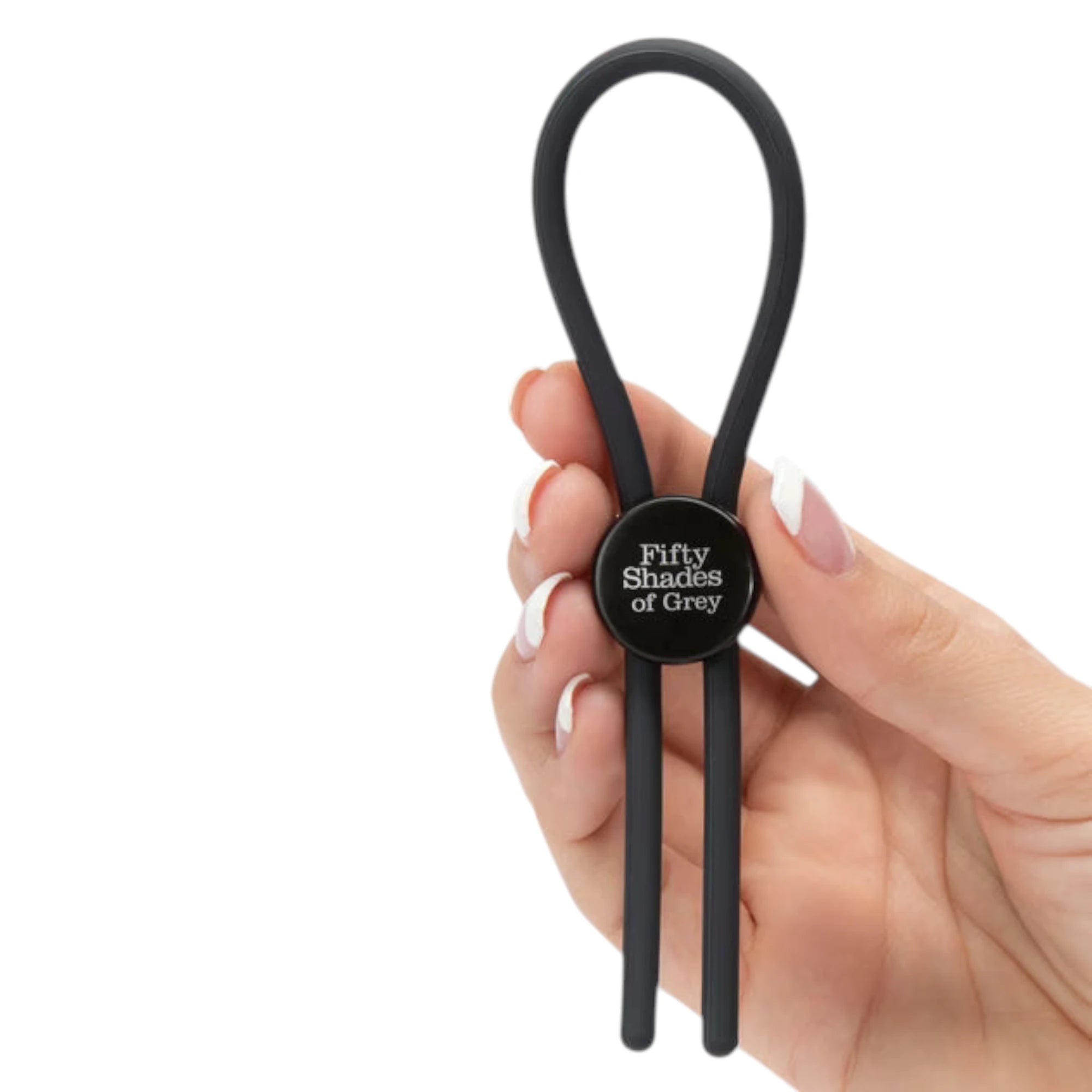Fifty Shades of Grey Again and Again black adjustable cock ring held in hand displaying dual silicone strands, metal connector ring with product branding, loop handle, and compact handheld size against white background