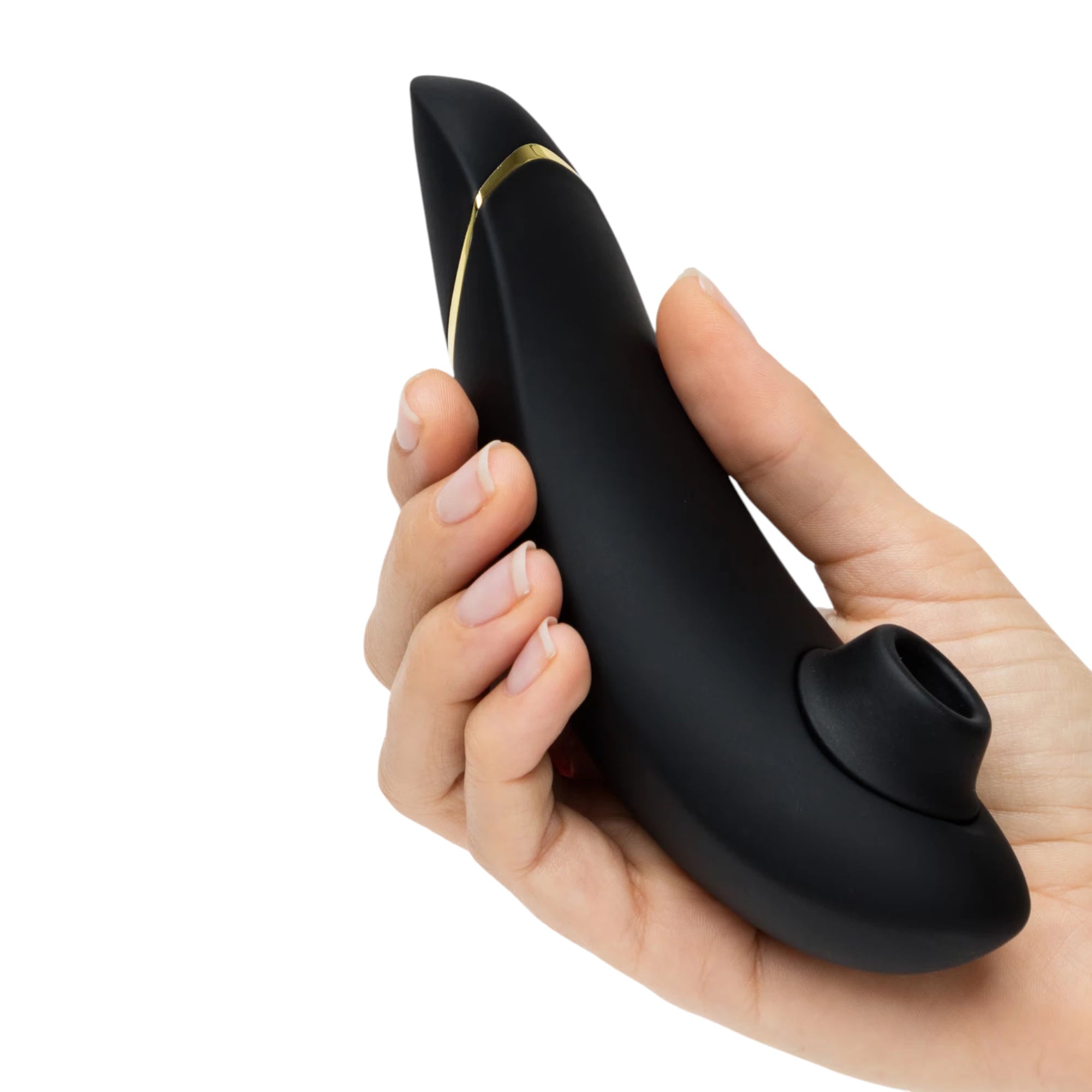 Womanizer Premium 2 black clitoral suction vibrator with gold accent held in hand against white background