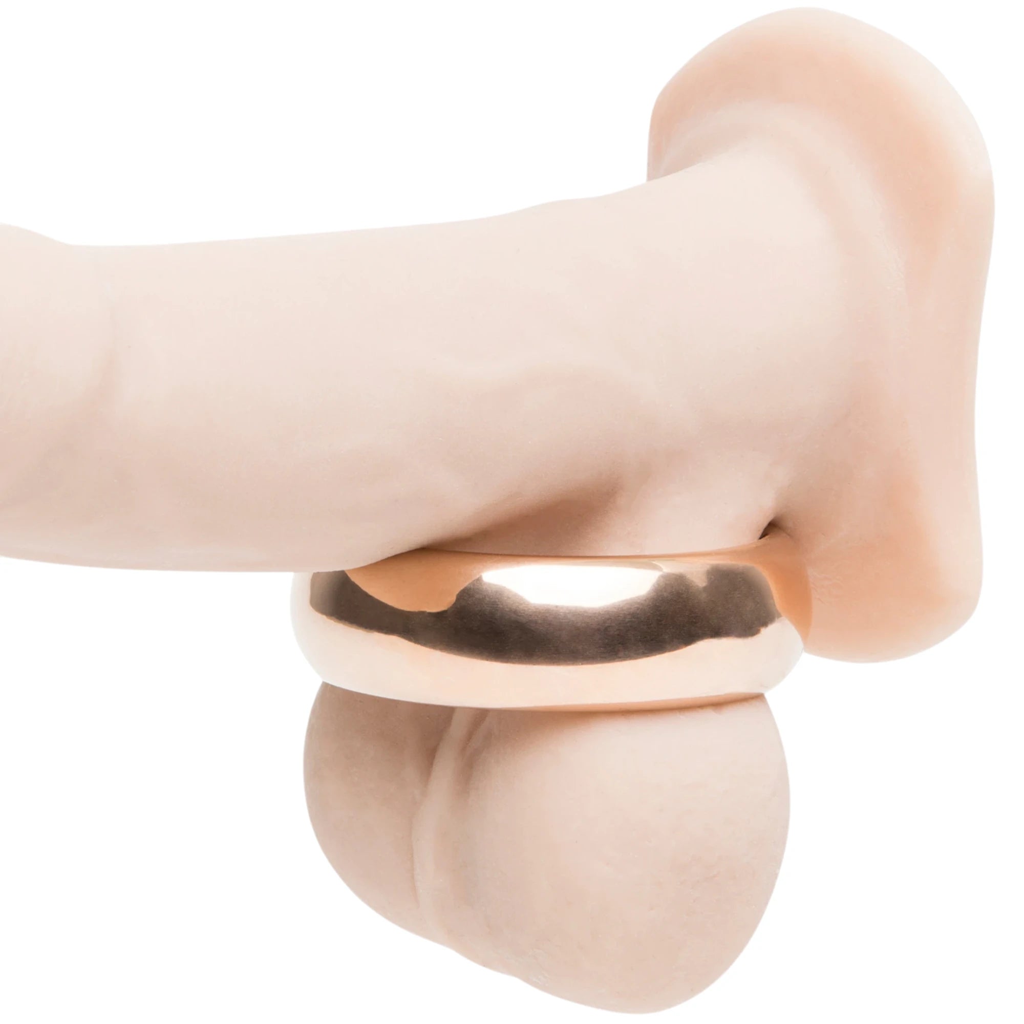 Fifty Shades Freed “I Want You Now” steel love ring in rose-gold finish shown on a silicone display from the side, highlighting the smooth rounded band and wide profile against a white background