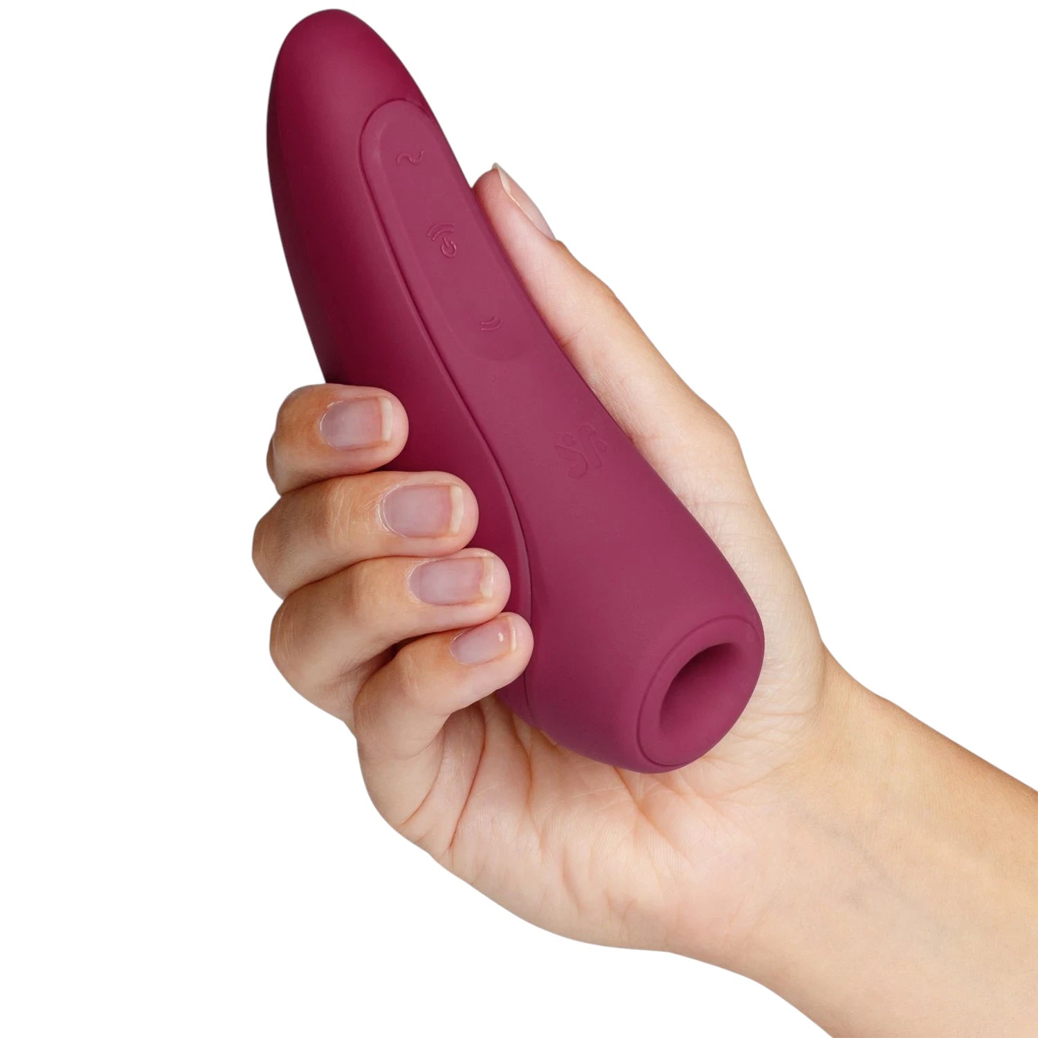 The Satisfyer Curvy 1+ clitoral suction vibrator in burgundy silicone with a tapered body, a rounded suction head with a circular opening, and embossed control icons on the front, shown held in a hand against a plain white background