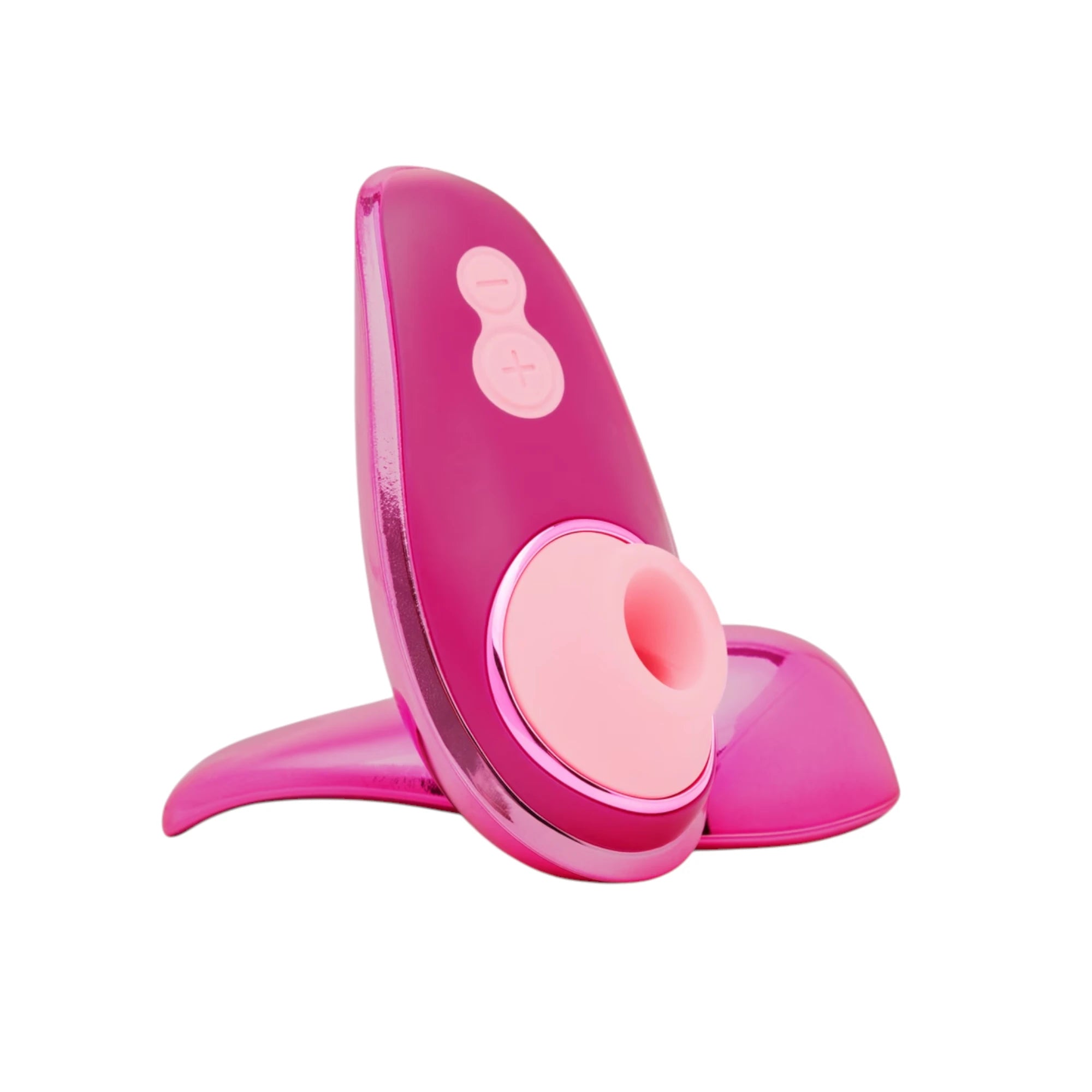 Womanizer Liberty 2 hot pink clitoral suction vibrator with charging stand against white background