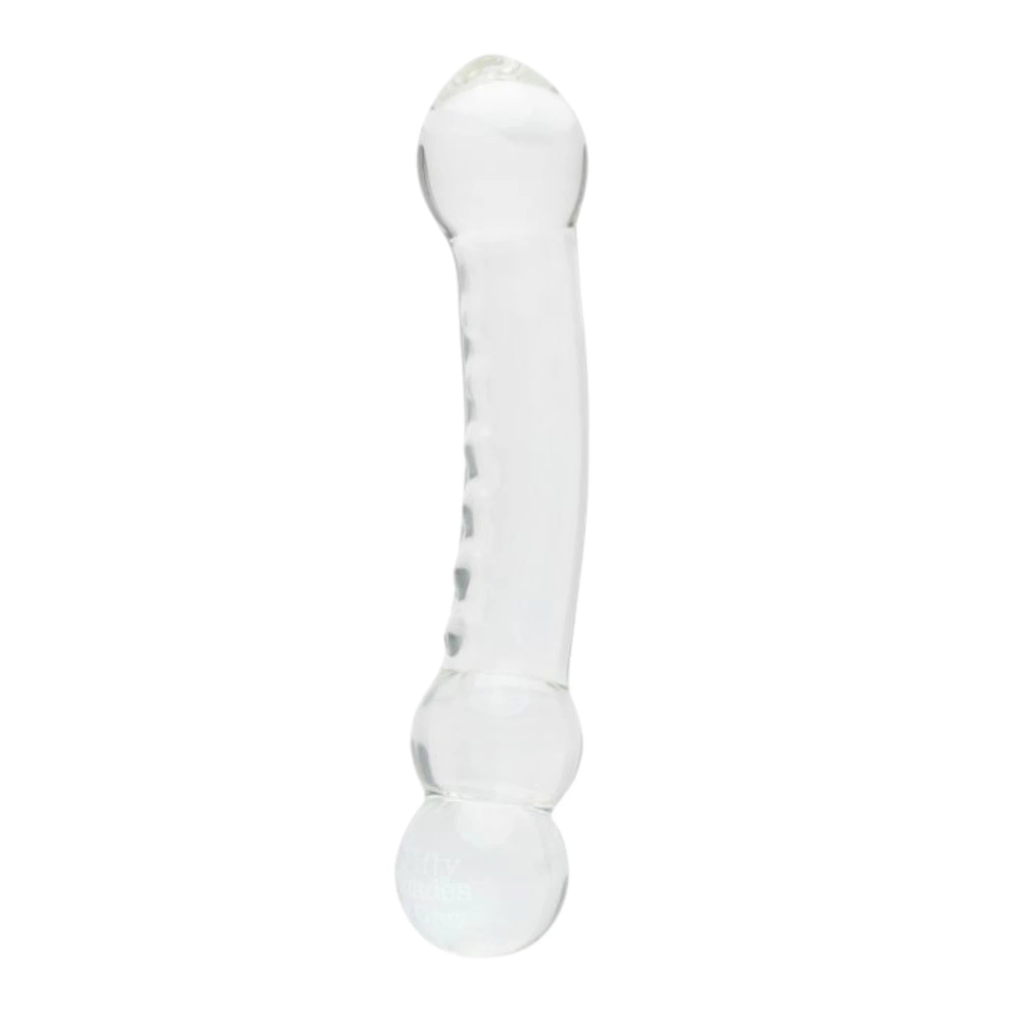 Fifty Shades of Grey Drive Me Crazy clear glass massage wand shown from front displaying smooth curved shaft, rounded bulb tip, raised textured grip bumps along side, and double rounded base design against white background