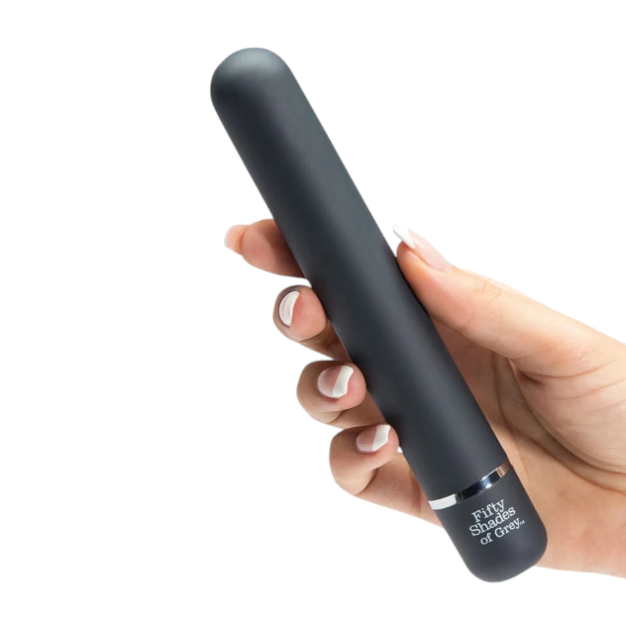 Fifty Shades of Grey Charlie Tango classic vibrator in black held in hand showing smooth cylindrical shaft, rounded tip, silver accent bands, and Fifty Shades of Grey branding on base against white background