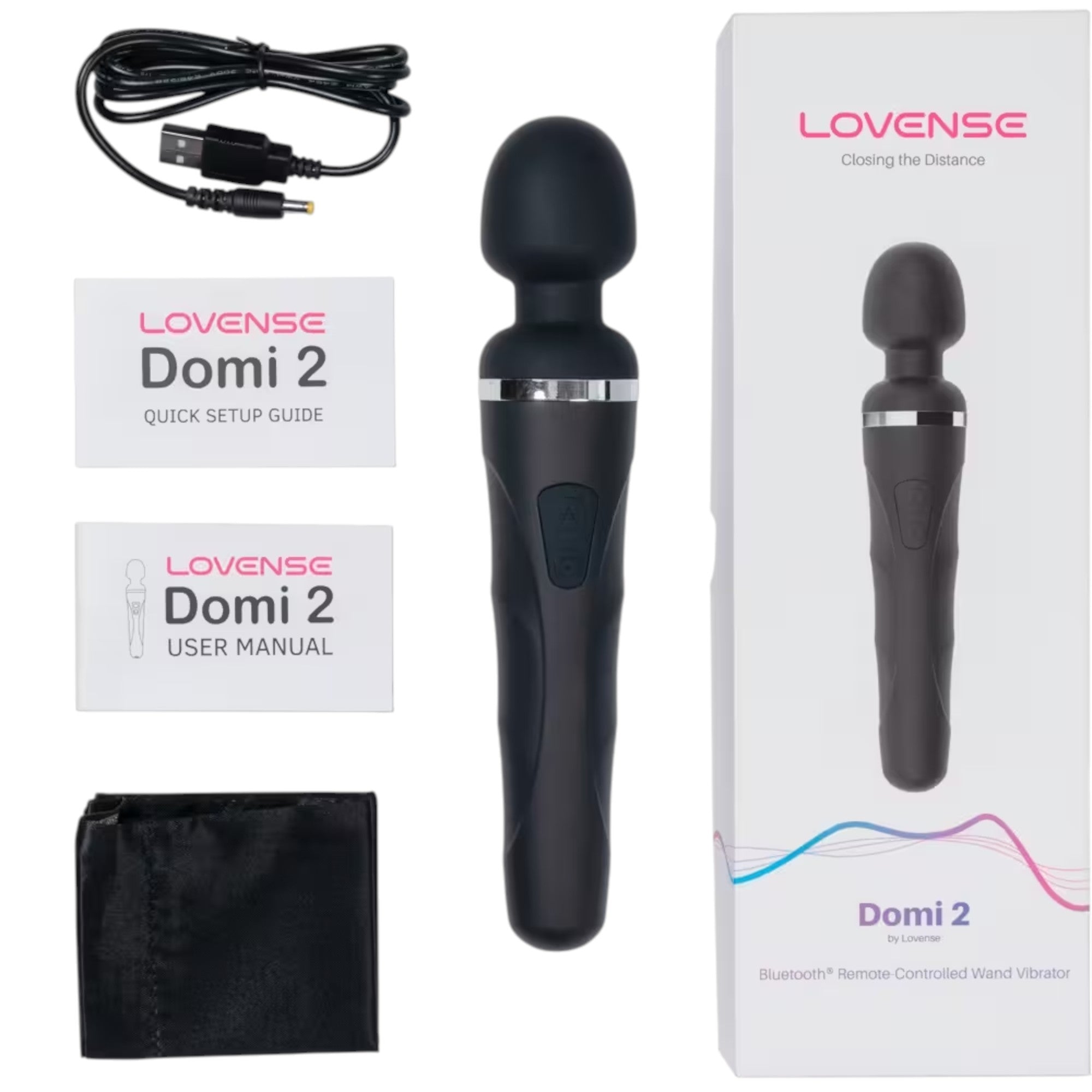 Lovense Domi 2 complete set displayed flat lay showing black rechargeable wand vibrator with rounded head and silver accent band, black USB charging cable, Lovense Domi 2 quick setup guide, Lovense Domi 2 user manual booklet, black storage pouch, and Domi 2 product box with Lovense branding and 'Bluetooth Remote-Controlled Wand Vibrator' descriptor against white background