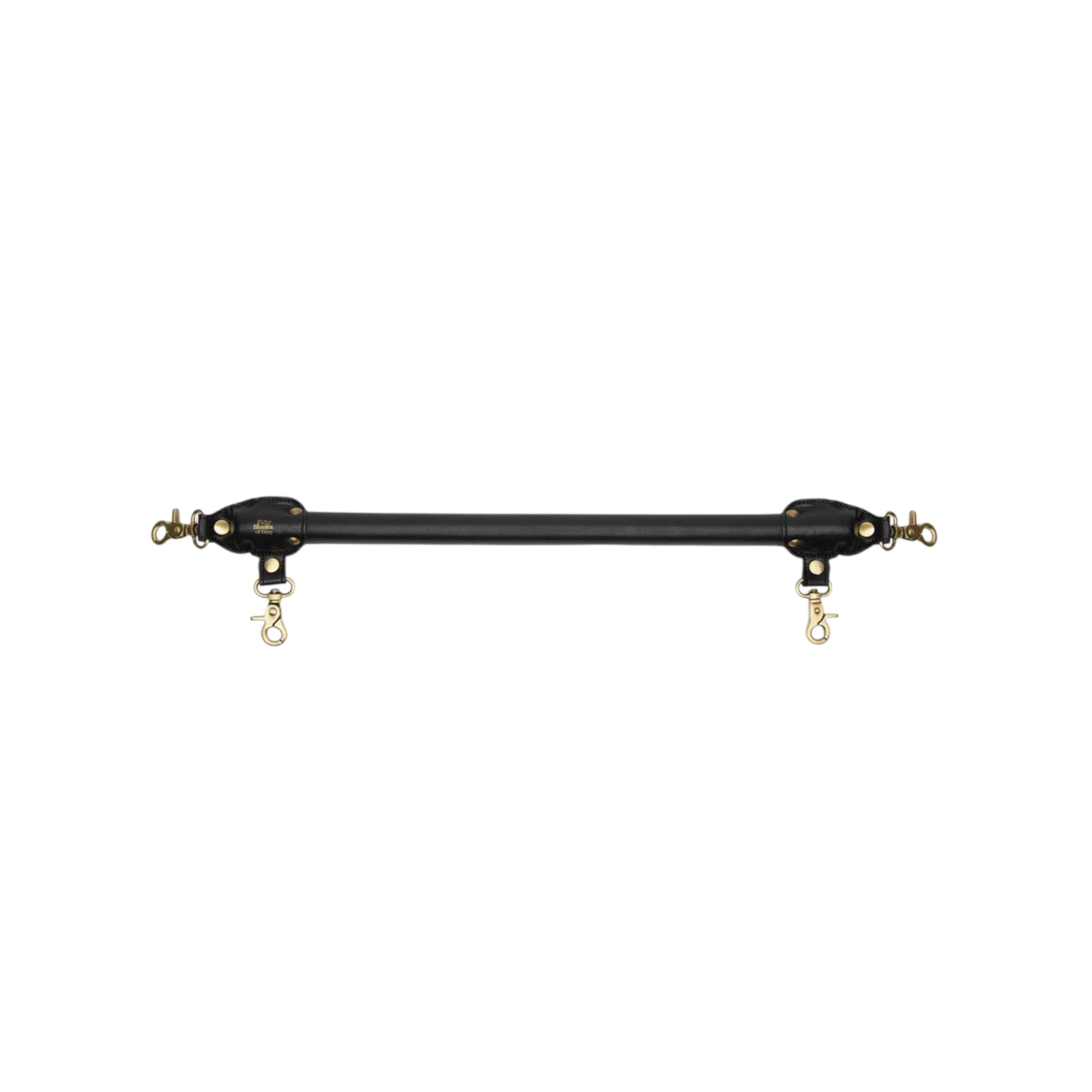 Fifty Shades of Grey Bound to You faux leather spreader bar shown from front displaying black leather bar, dual gold-toned attachment points with cuffs on each end, and gold chain links against white background