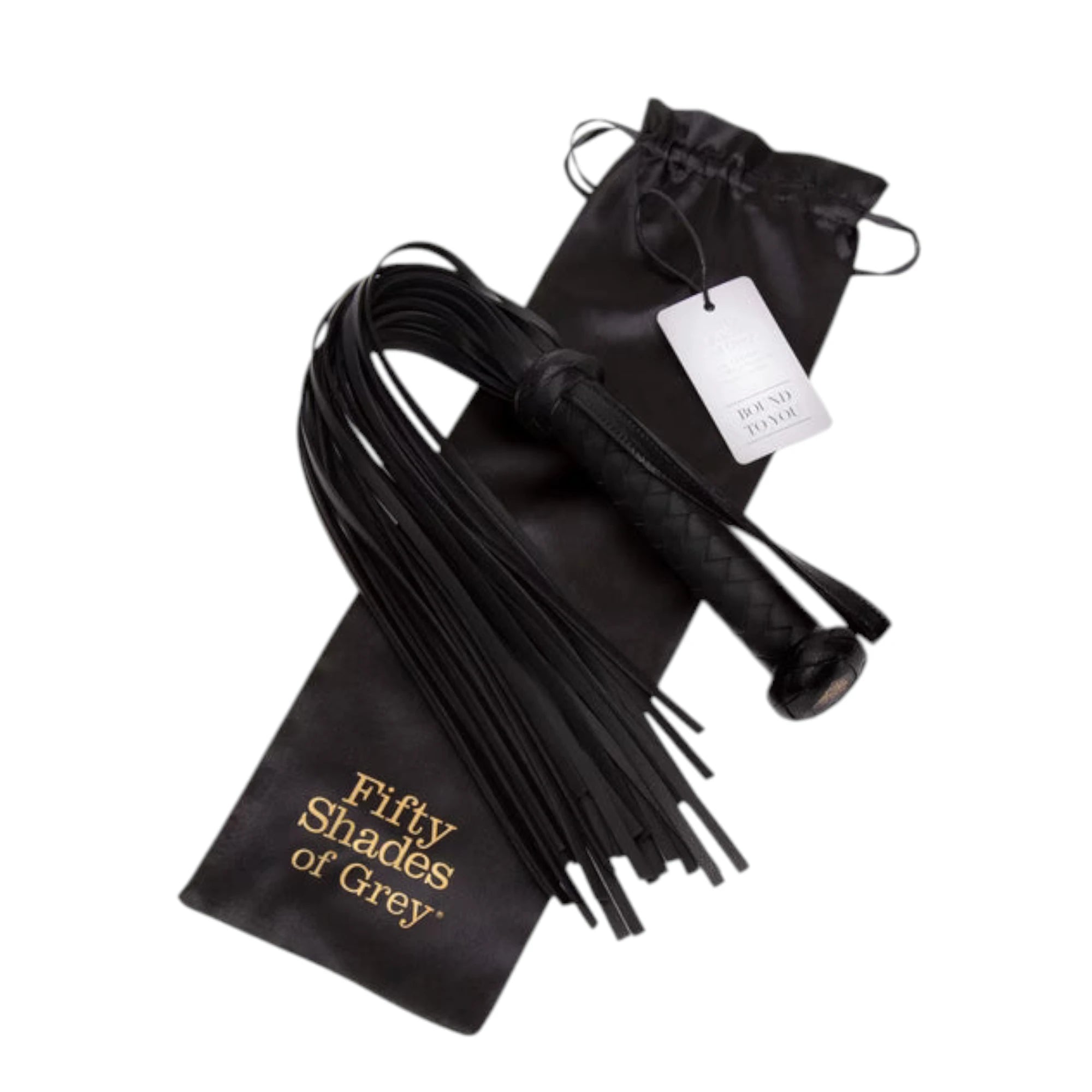 Fifty Shades of Grey Bound to You faux leather flogger in black displayed with black satin storage pouch featuring drawstring closure and 'Fifty Shades of Grey' gold branding, product tag attached, showing braided handle with wrist loop and multiple leather tassels against white background