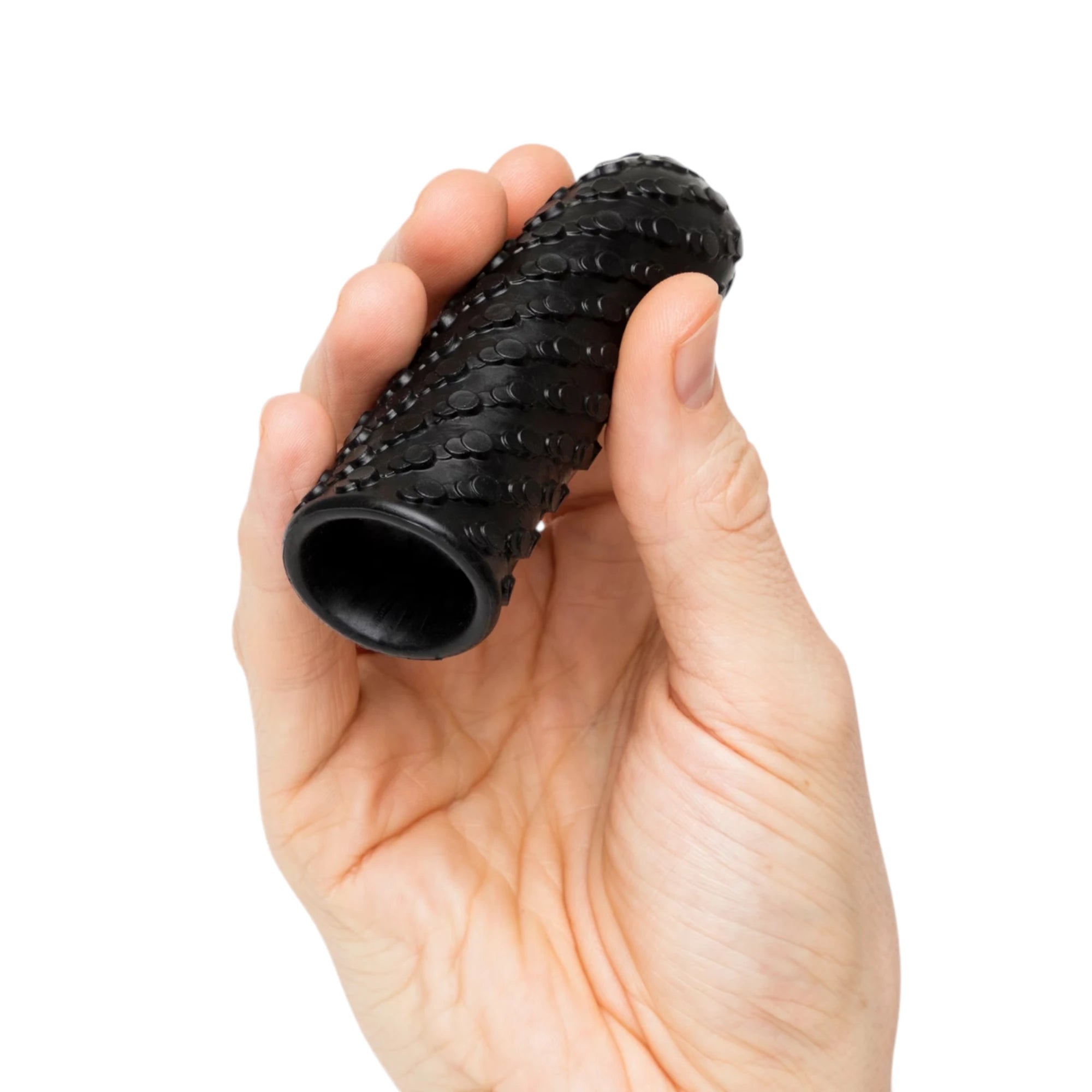 Arcwave Ghost black reversible silicone male stroker with textured bumped surface held in hand displaying open entrance against white background