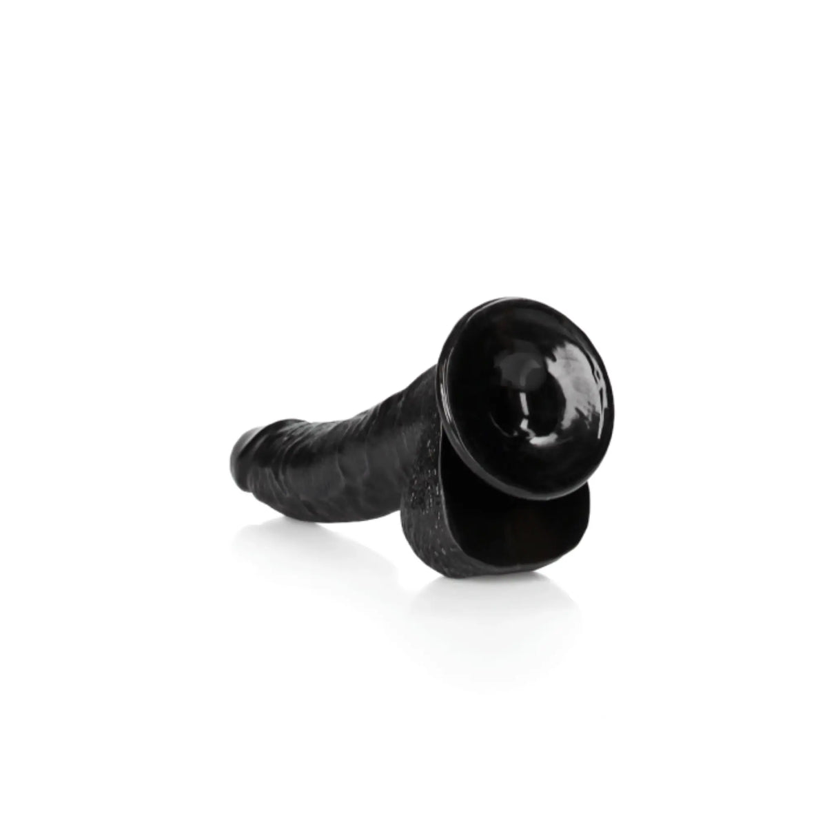 Real Rock black curved realistic dildo and balls with suction cup 8 inch lying on its side showing the suction cup base against white background