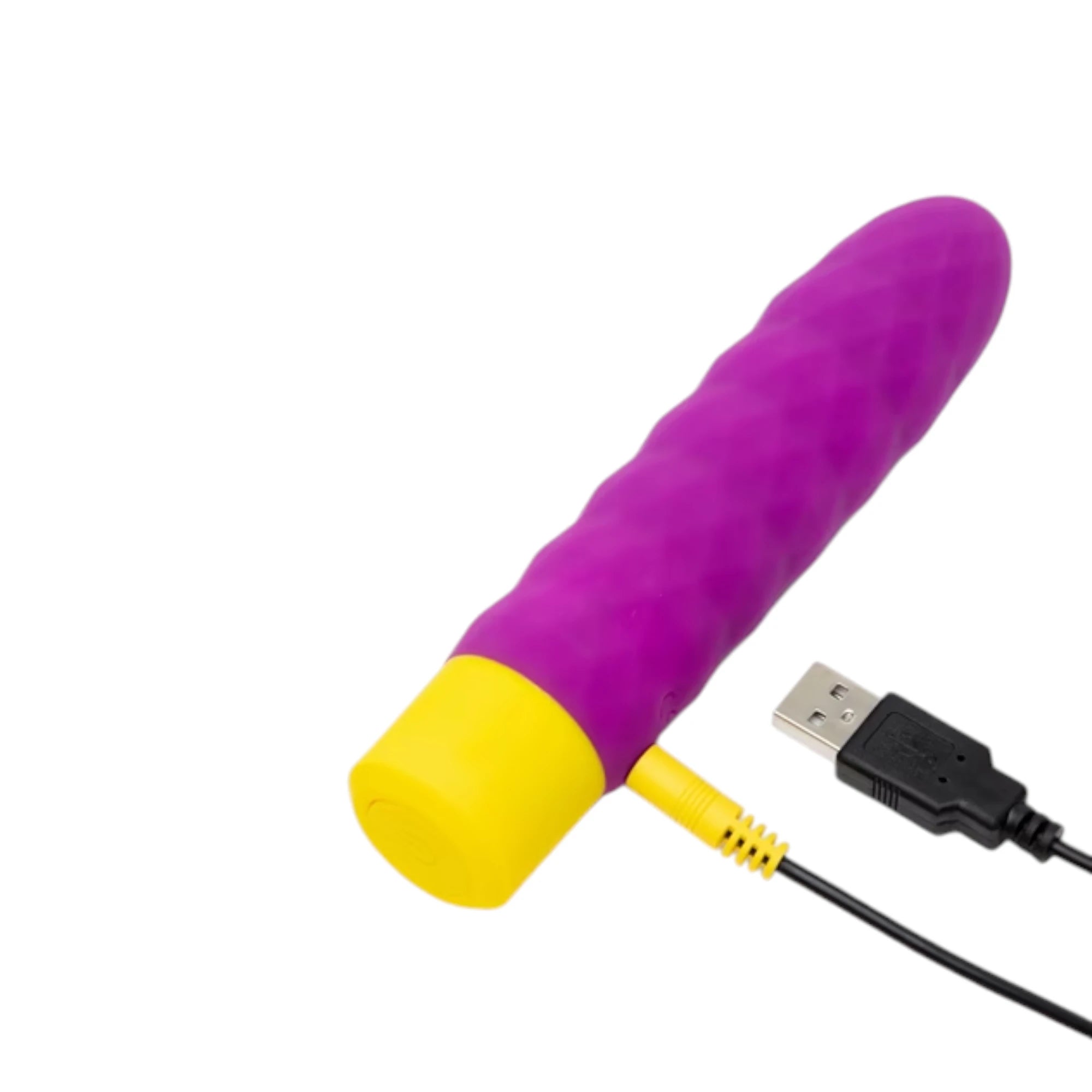 The ROMP Beat rechargeable textured bullet vibrator in purple silicone with a ribbed rounded shaft and a yellow base, shown on a plain white background with a USB charging cable plugged into the side.