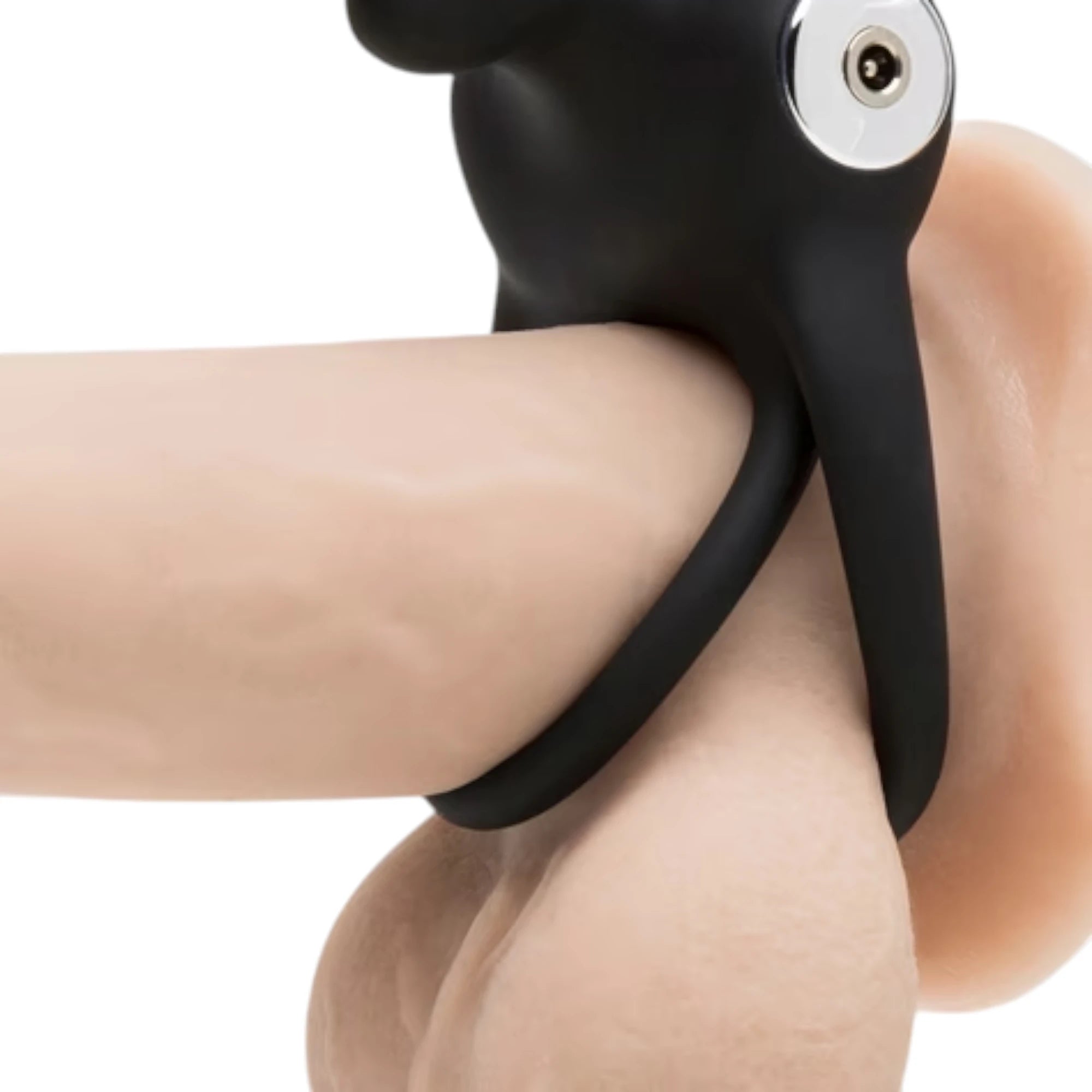 Happy Rabbit stimulating rabbit cock ring in black silicone worn on body displaying curved rabbit ear stimulator and flexible fit against white background