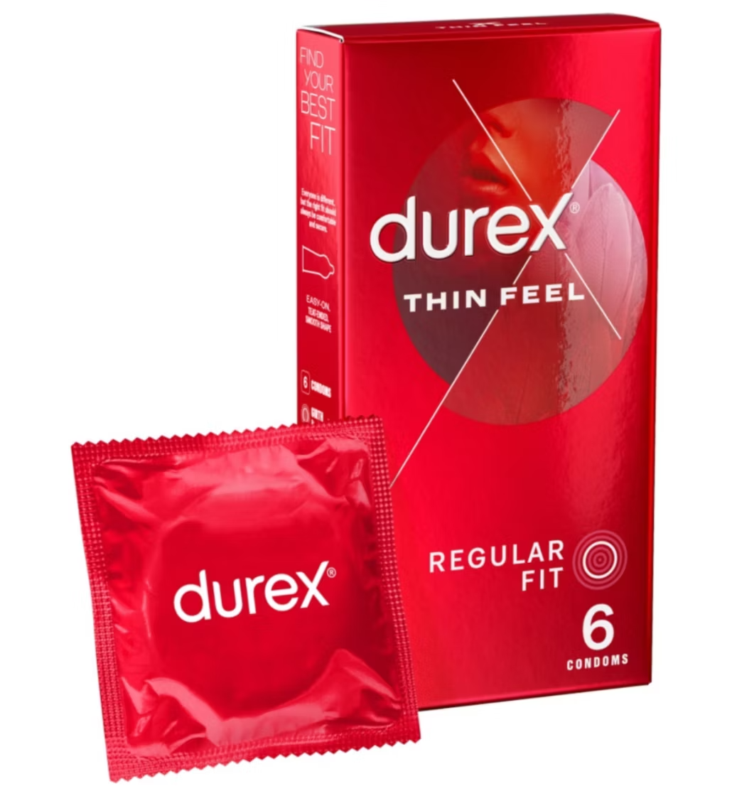 Durex Thin Feel Regular Fit red packaging box with 'Find Your Best Fit' text and condom product image, displayed with one red foil-wrapped condom packet against white backgroun