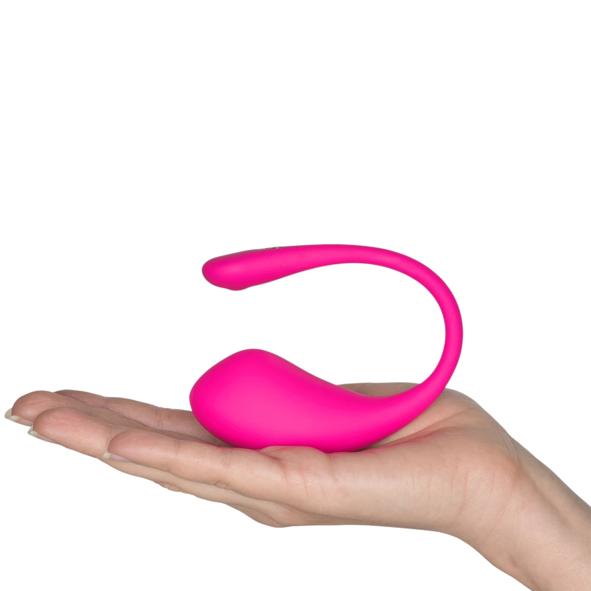 Lovense Lush 3 hot pink wearable egg vibrator with curved tail held in open palm against white background