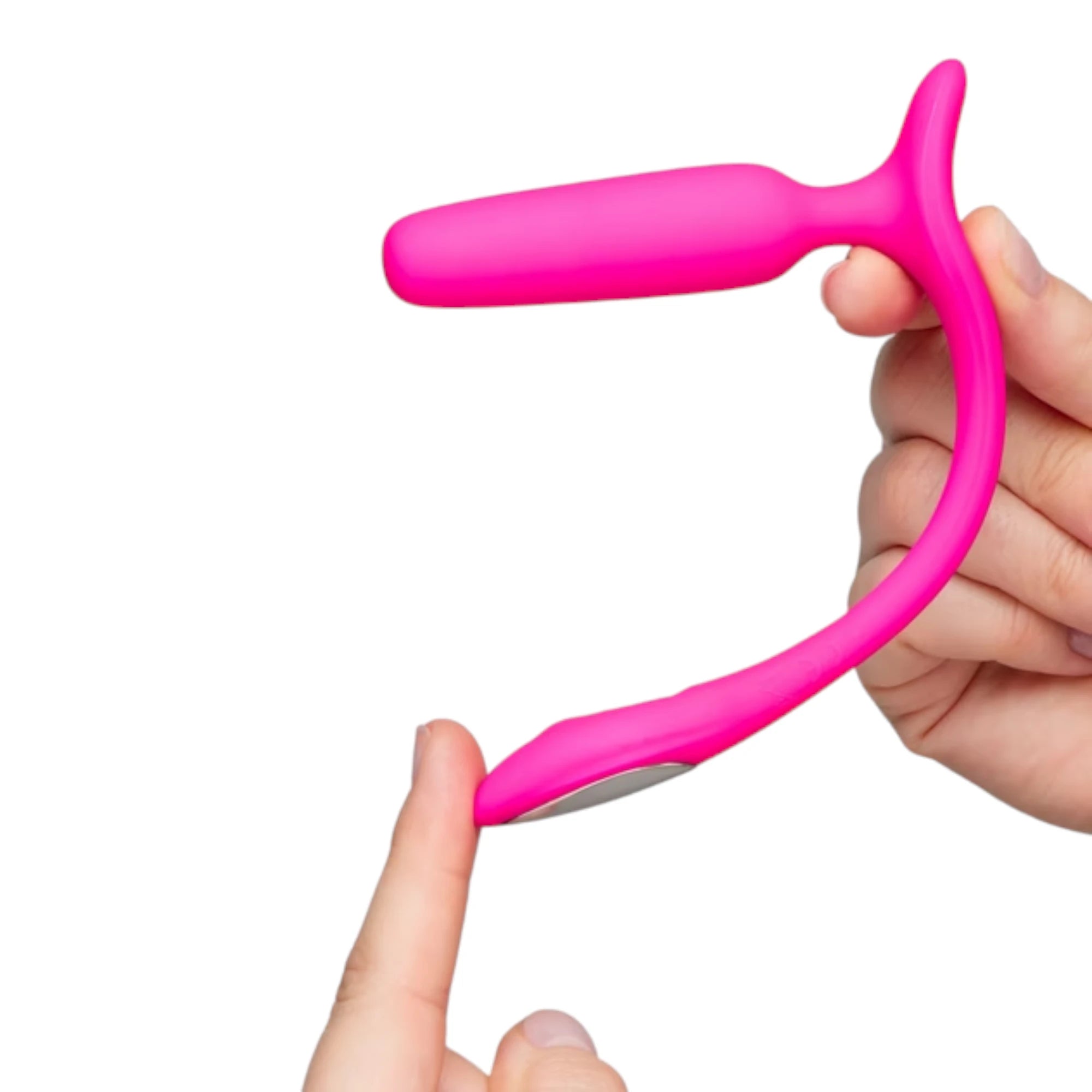 Lovense Lush anal vibrating butt plug in pink shown held in a hand, with a finger touching the curved tail to highlight the external contact area and ergonomic shape against a white background.