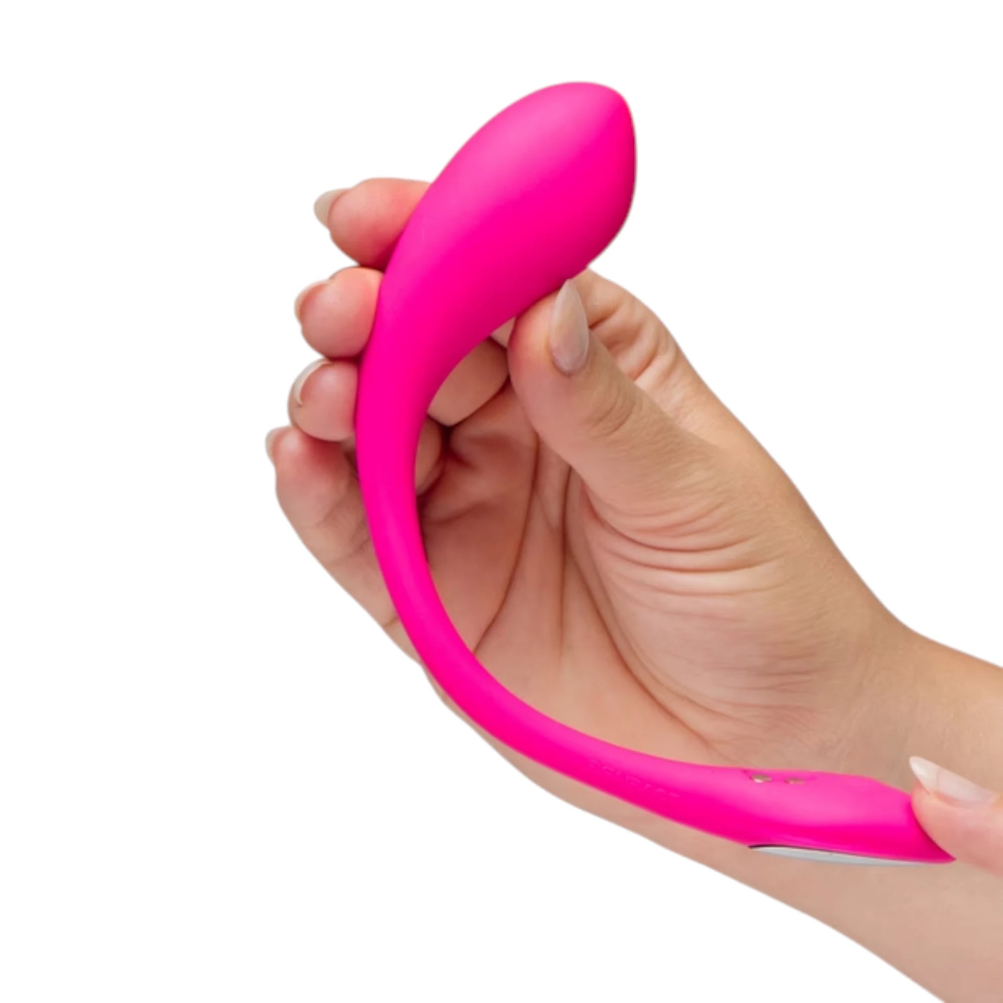Lovense Lush 4 Mini vibrating egg in pink shown held in a hand at an angle, highlighting the smooth curved silicone body and compact wearable design against a white background