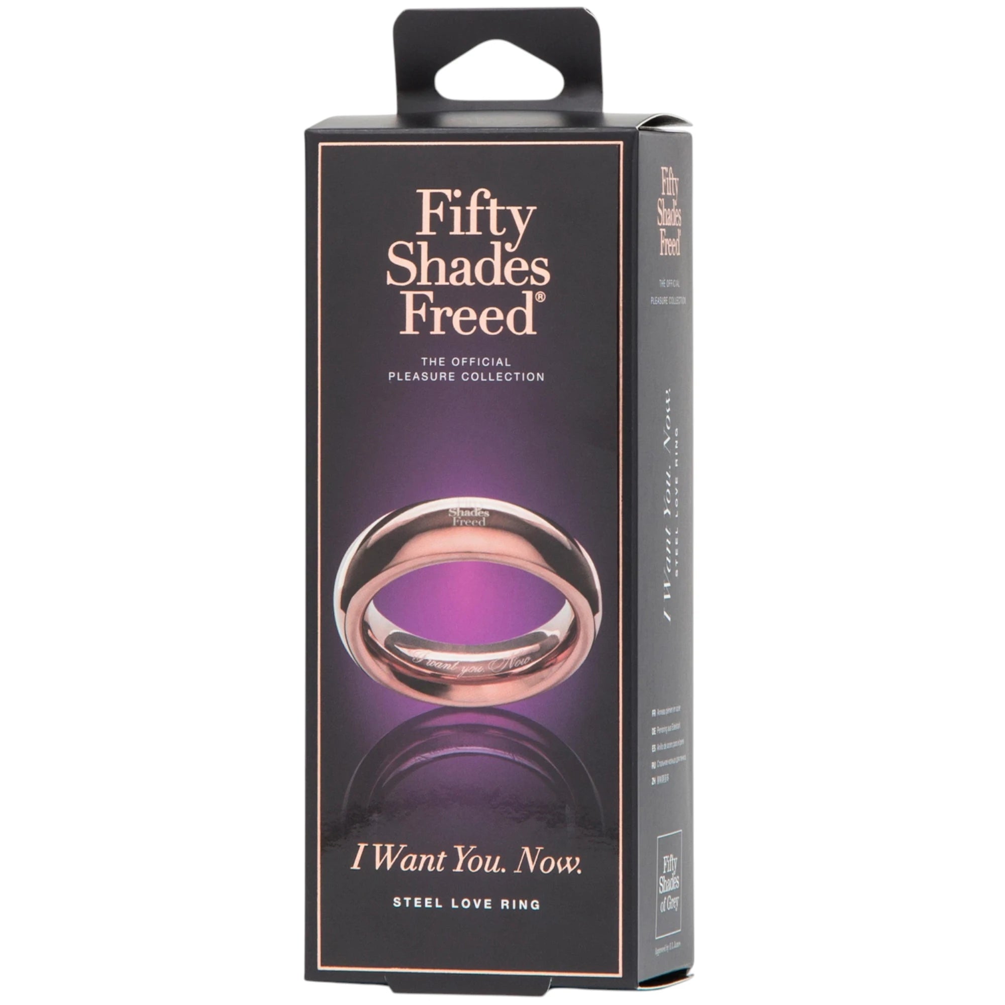 Fifty Shades Freed “I Want You Now” steel love ring retail box shown upright, featuring Fifty Shades Freed branding and an image of the rose-gold ring on the front with the “I Want You. Now.” product name printed below against a white background.