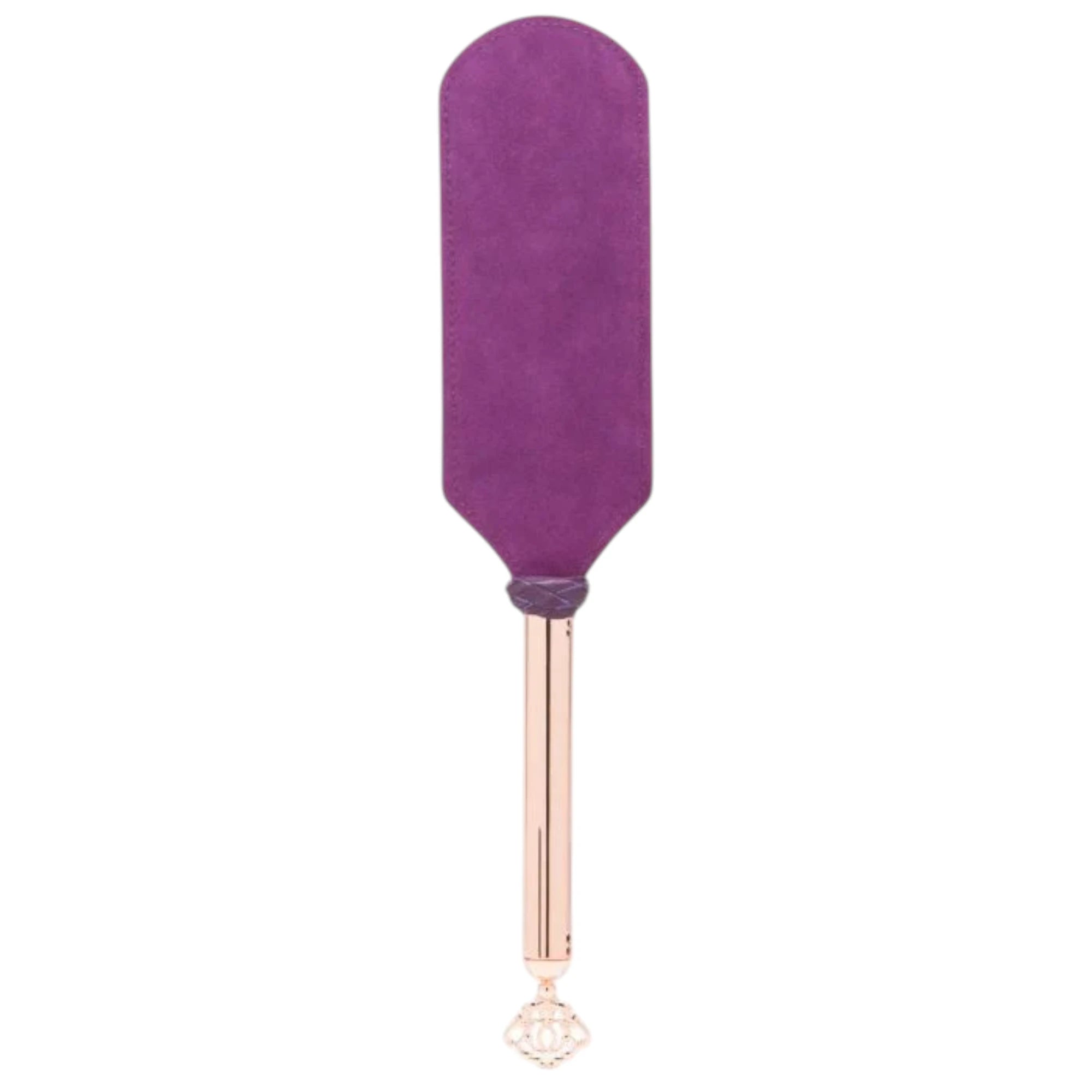 Fifty Shades Freed Cherished Collection leather and suede paddle shown full length from the reverse side, featuring a wide purple suede paddle head and a rose-gold handle with braided grip detail and an ornate key-shaped charm at the end against a white background