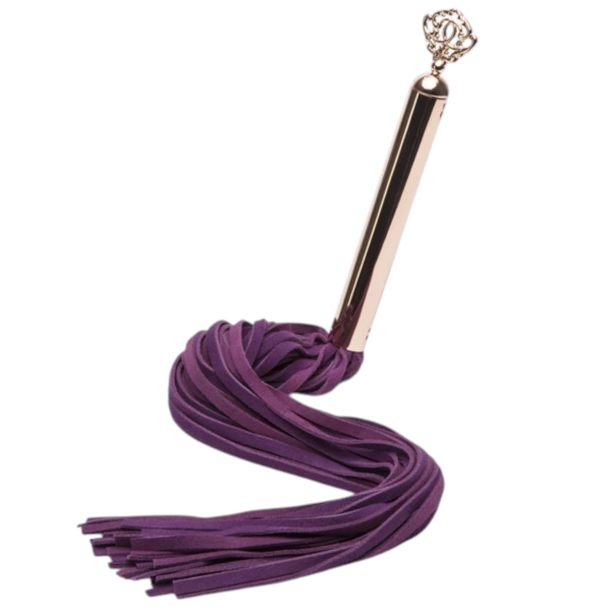 Fifty Shades Freed Cherished Collection flogger shown coiled, featuring purple faux-leather tails attached to a rose-gold handle with a decorative key charm at the end against a white background.