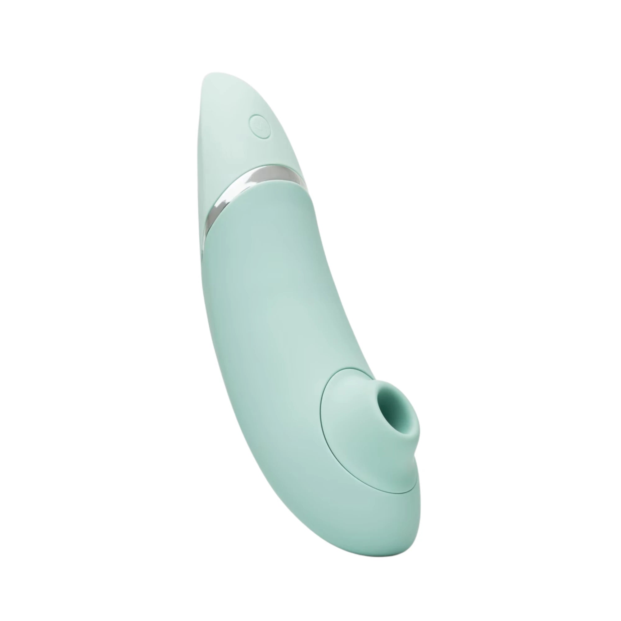 Womanizer Next clitoral suction stimulator in mint green, shown at an angled side view with a curved ergonomic body, metallic accent band and the suction nozzle opening visible at the tip against a white background