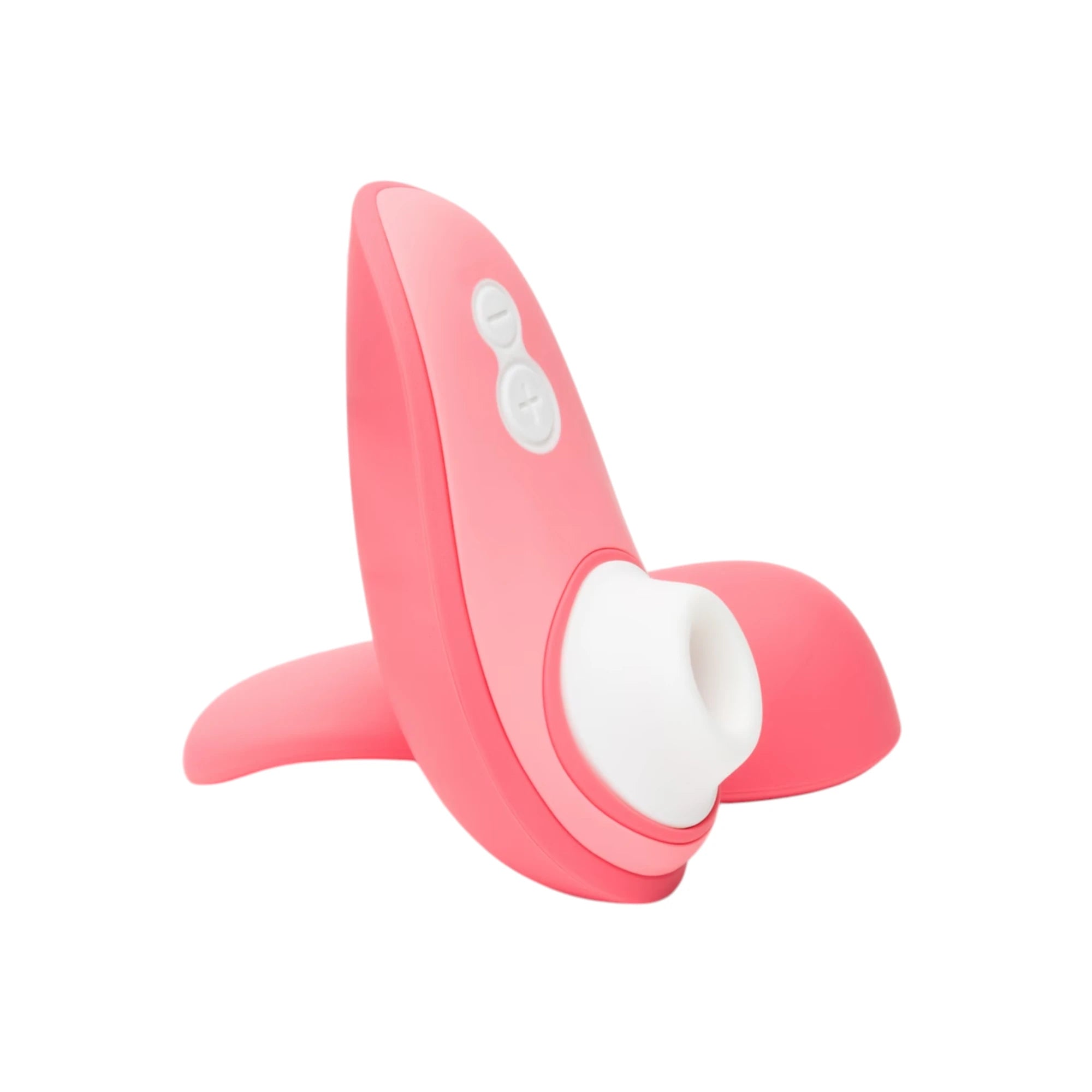 Womanizer Liberty 2 coral pink clitoral suction vibrator with charging stand against white background