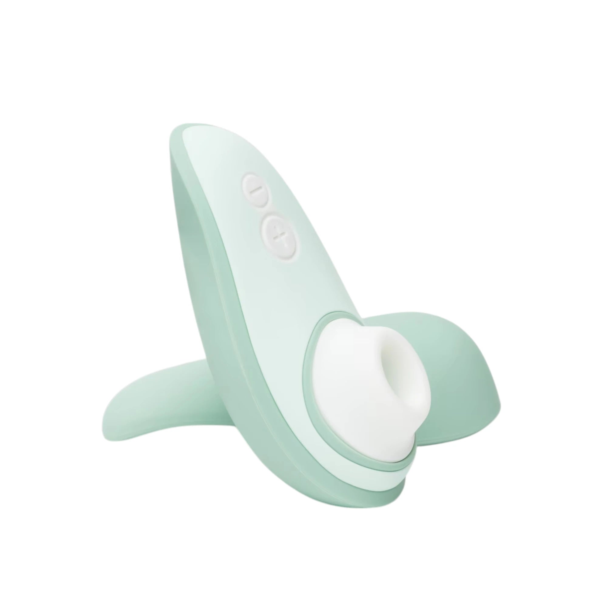 Womanizer Liberty 2 sage green clitoral suction vibrator with charging stand against white background