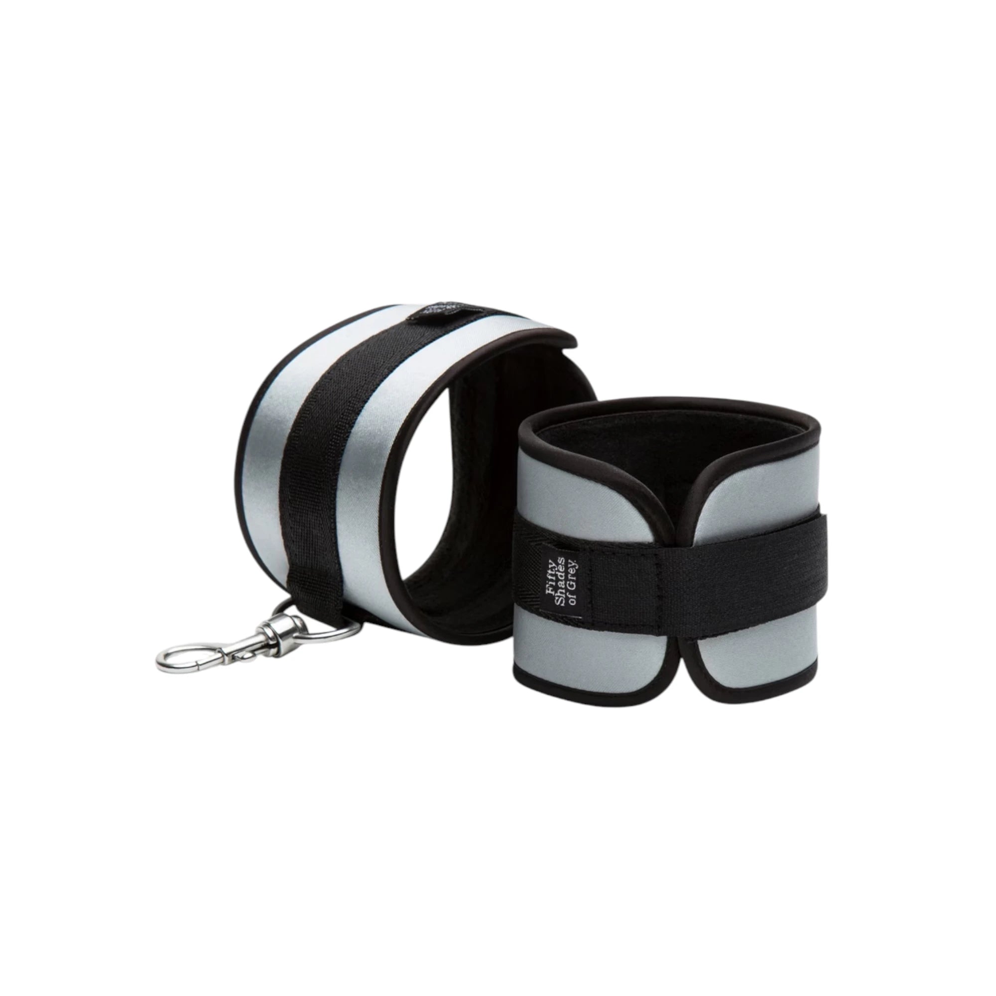 Fifty Shades of Grey Hard Limits padded wrist cuffs shown from front displaying black and grey adjustable cuffs with soft lining, velcro straps, and silver metal clip attachment against white background