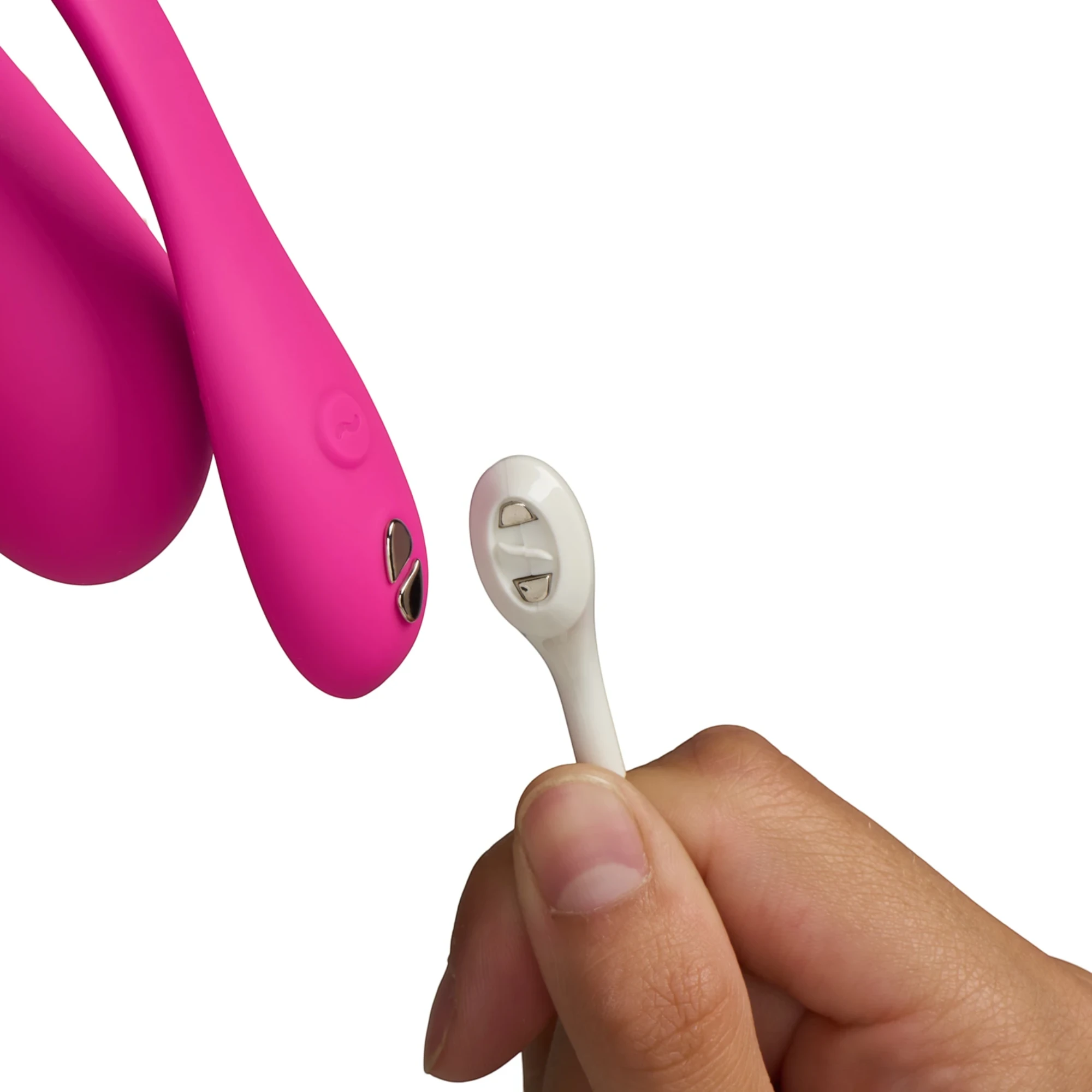 We-Vibe Jive 2 hot pink wearable love egg vibrator with white wireless remote control held in hand against white background