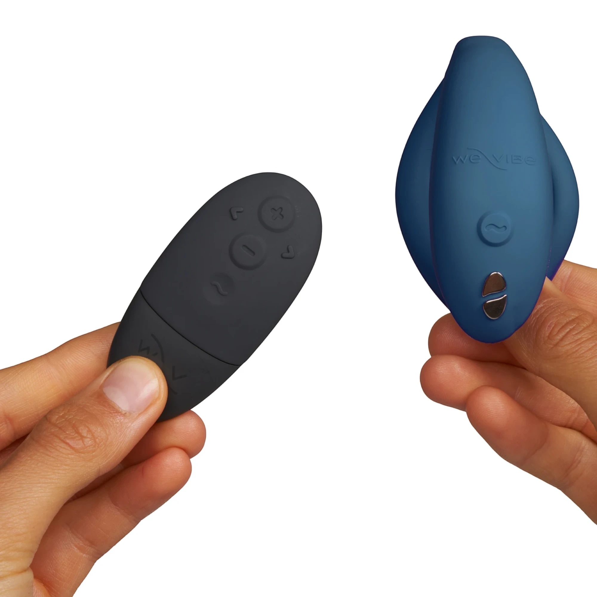 We-Vibe Sync O teal couples vibrator with black wireless remote held in hands against white background