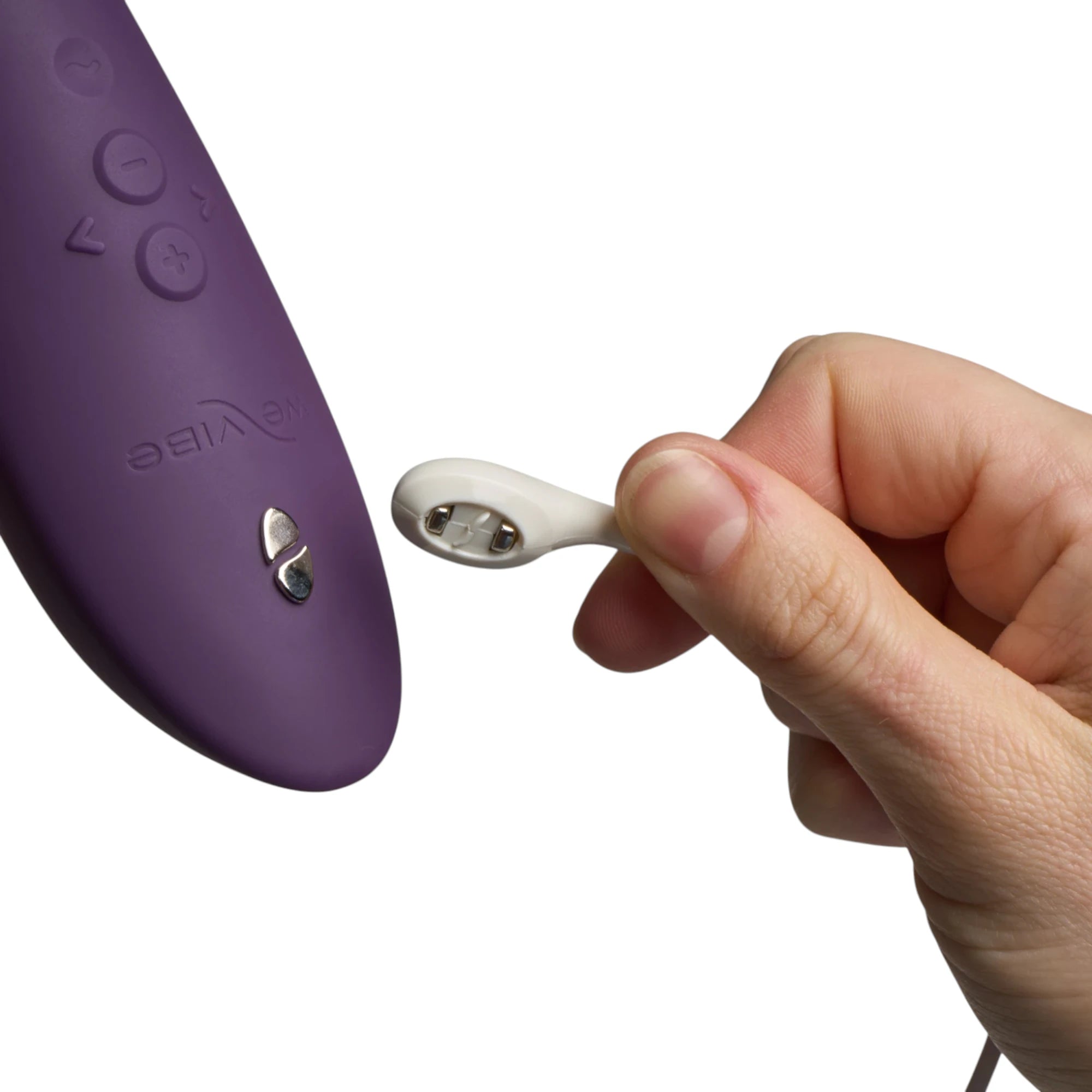 We-Vibe Wand 2 deep purple wand massager with wireless remote control held in hand against white background